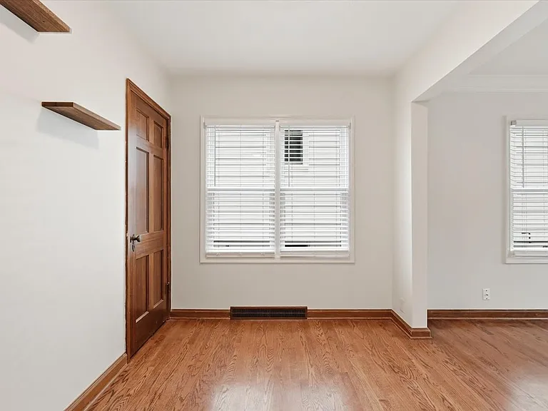 Hardwood floors on main level with door leading to 2nd floor.