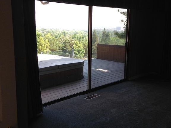 View of deck and hot tub