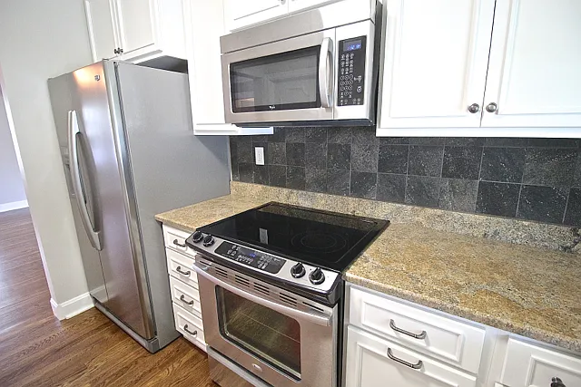 216 W 51st Terrace | Patio & Updated Kitchen — Photo 1