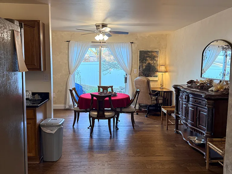Dining room leading to backyard.
Convenient Powder room for guests. Pantry closet and corner workspace.