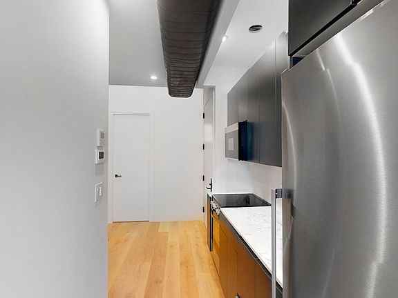 2nd image of 77 E 3rd St APT 7