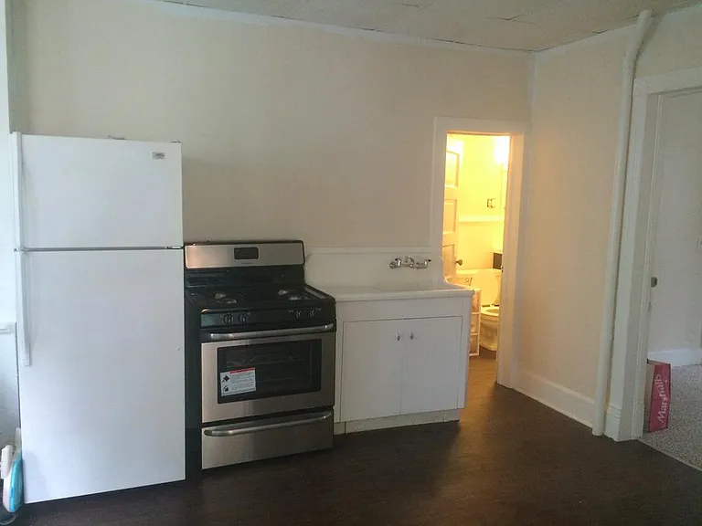 Kitchen, looking from front entryway.