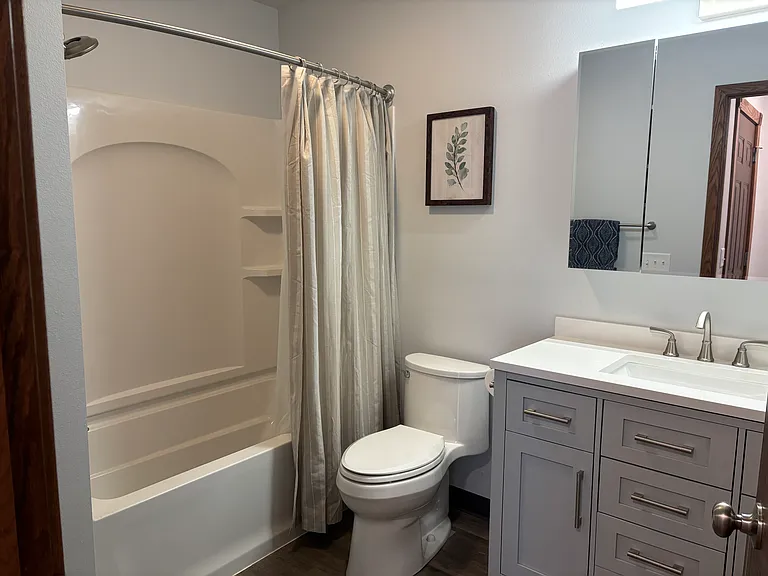 Main floor full bathroom with tub