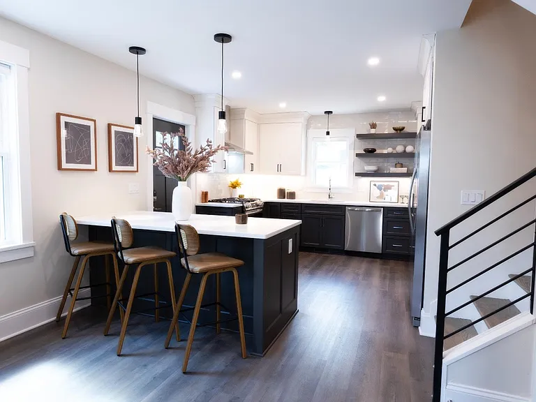 Dinner is served! Our sleek dining & kitchen space adds the perfect touch of modern elegance for your next dinner party guests. #luxurydining #neverstopentertaining
