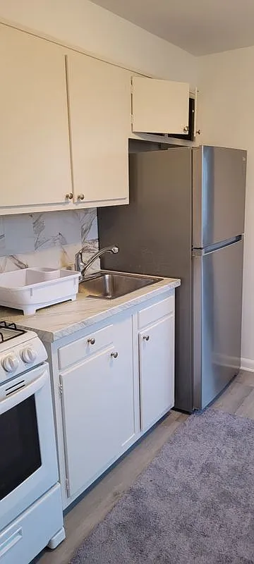 7712 Watson St — Photo 4