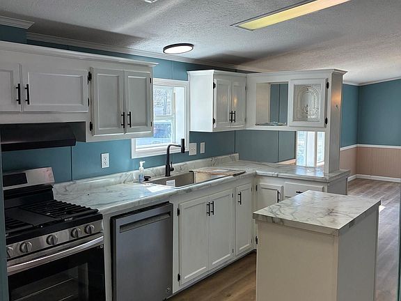 5th image of 5817 N Rod And Gun Club Rd