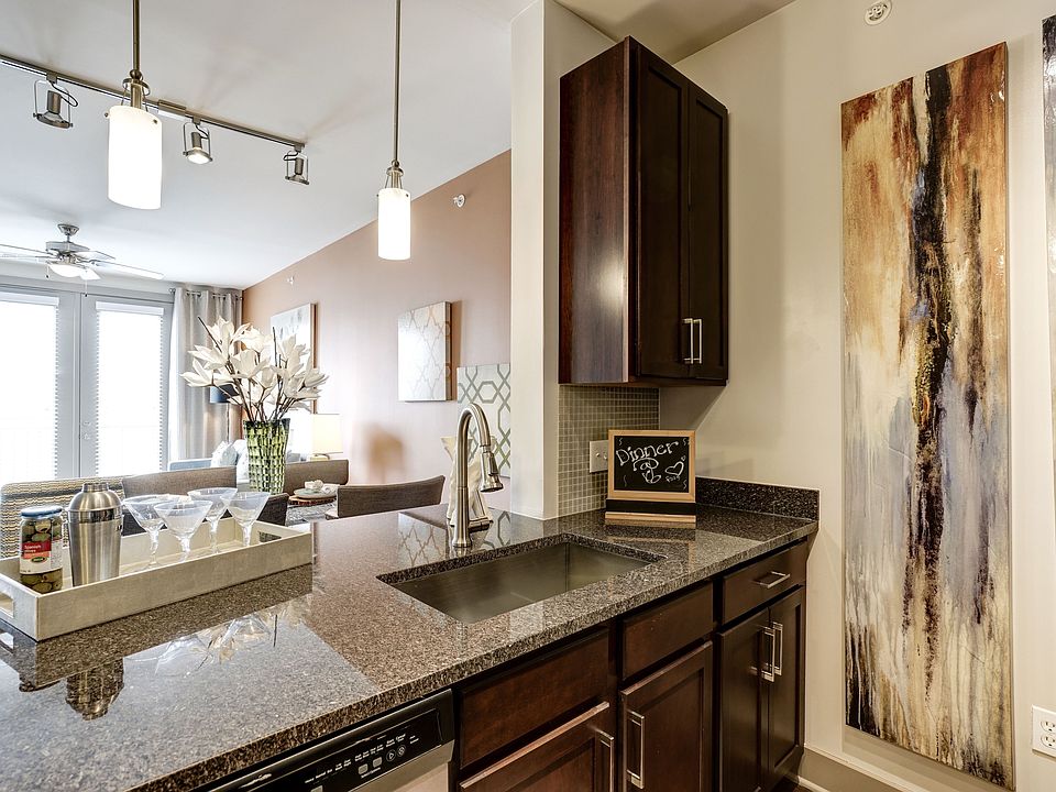 Opulent Track Lighting in Kitchen & Dining Area