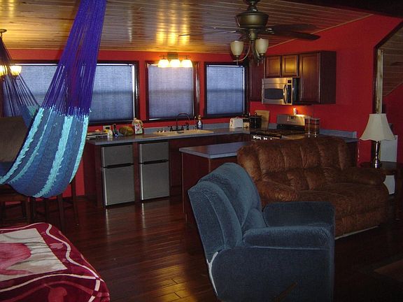 Living area and kitchen. Furniture picture is for show purposes only.