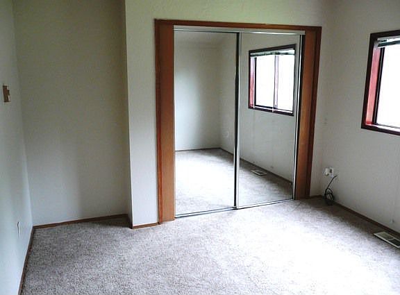 Master Bedroom with mirrored sliding doors