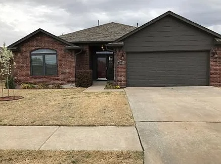 Front of House with 2 car garage