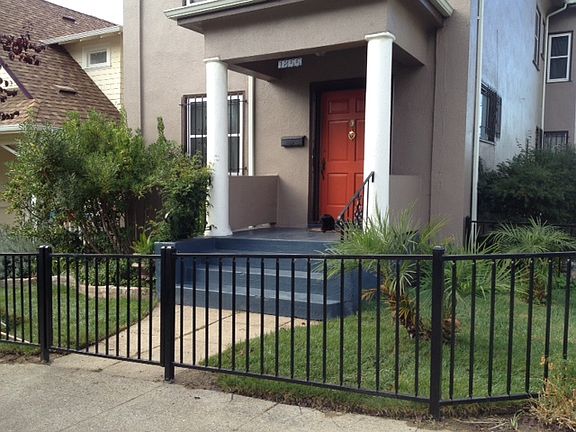 Front fence and yard