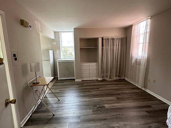 Studio apartment with built-in drawers.
