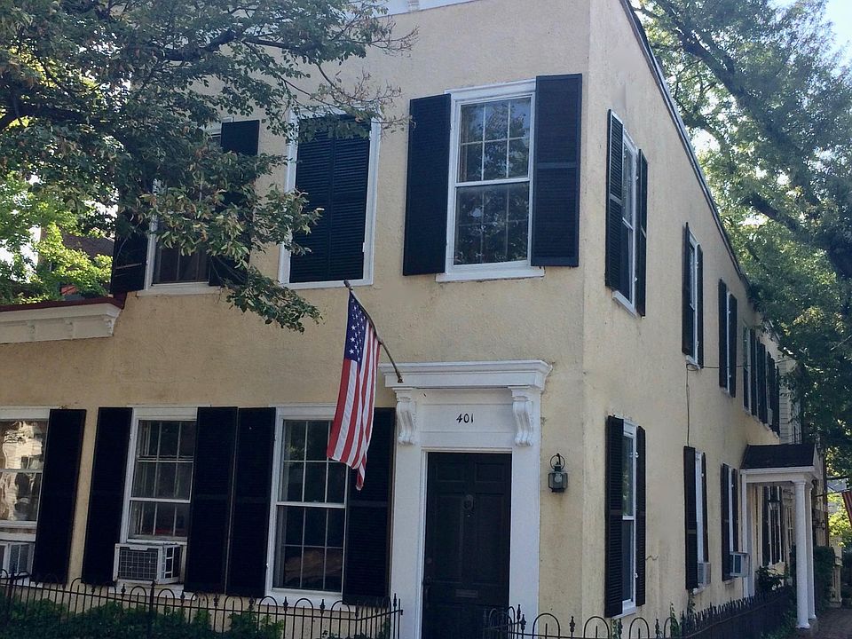 Welcome to 302 Wolfe St (portico side) and 401 S Fairfax entrance (flag).
