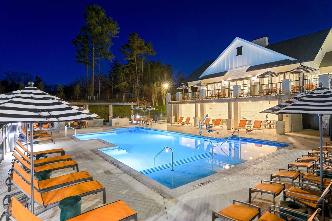 Resort pool and poolside chaise lounges