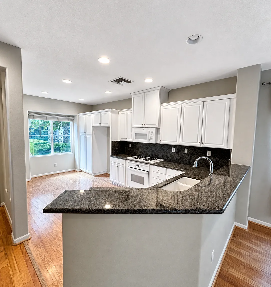 Open Floor Plan, One Bedroom Downstairs, and Spacious 2 Car Garage! — Photo 2