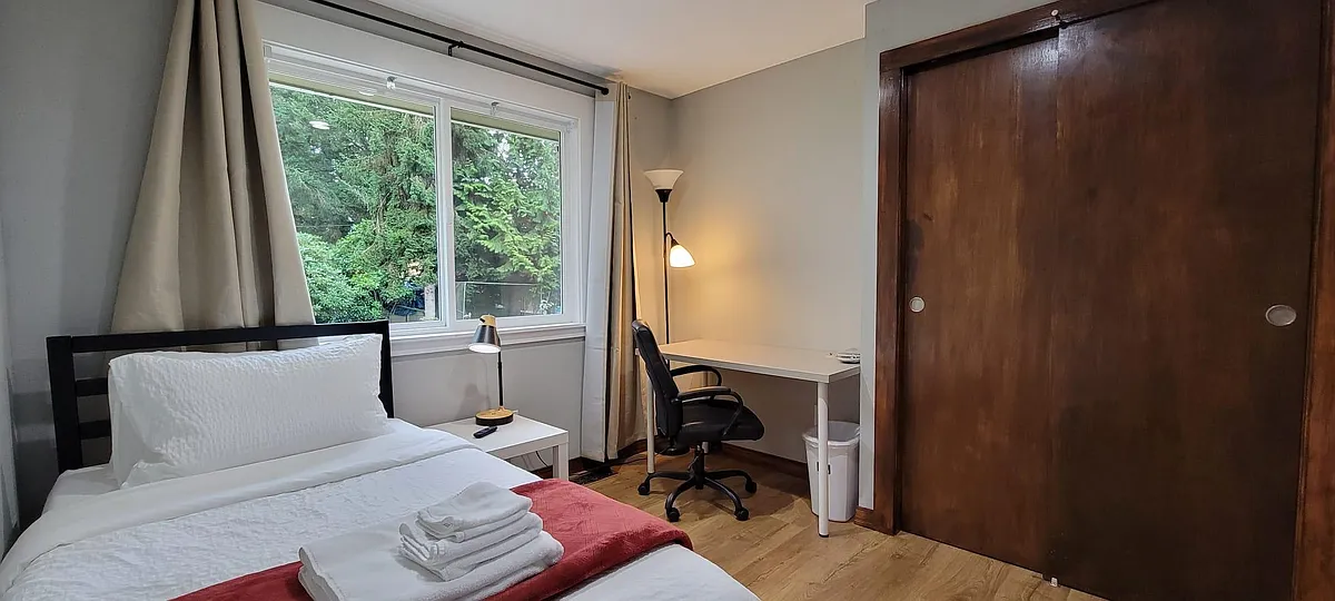 Photo 2 of 22 - 1803 N 200th St #D - Seattle, WA Bedroom with backyard view - 1803 N 200th St #D