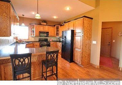 Kitchen offers plenty of recessed and natural lighting