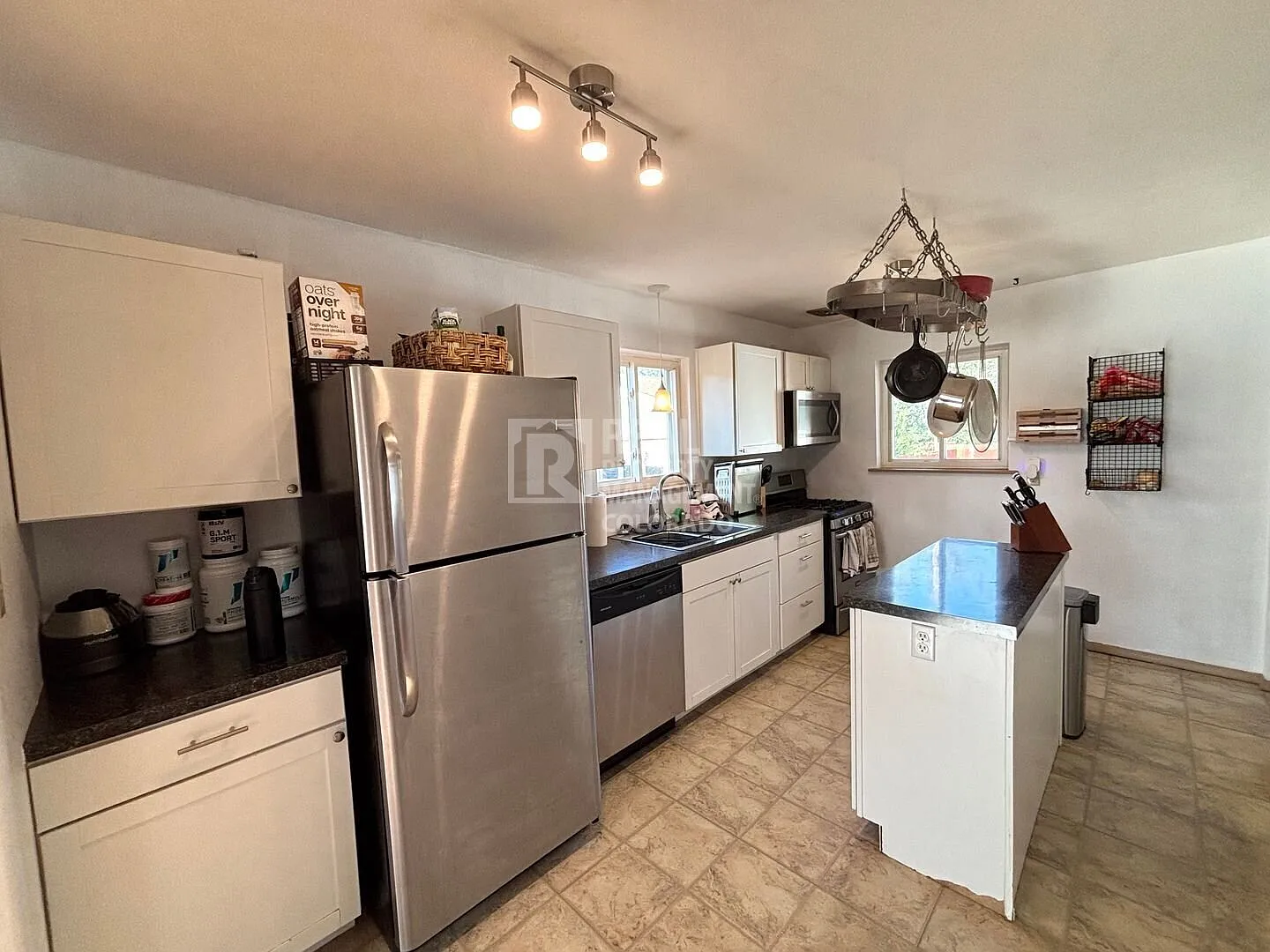 Over 2,000 Sq Ft! Finished Basement, Bonus Rooms & Large Fenced Yard — Photo 4
