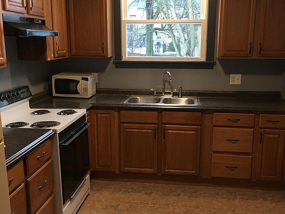 Kitchen: Freshly Painted, Brand New Cabinets, Countertops, Window, Floor, Lighting and Stove Vent. All Appliances Included!