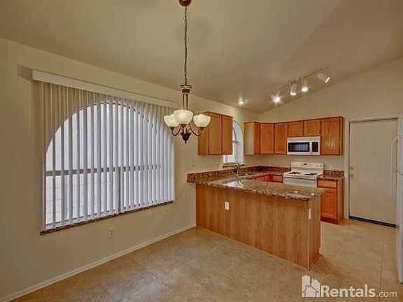 4th image of 9845 W Yukon Dr
