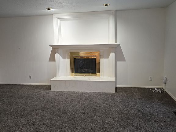 Upstairs living area with fireplace
