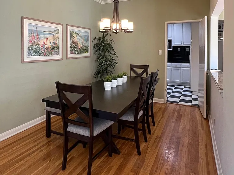 Dining room table seats 6 (extra folding chairs if needed)