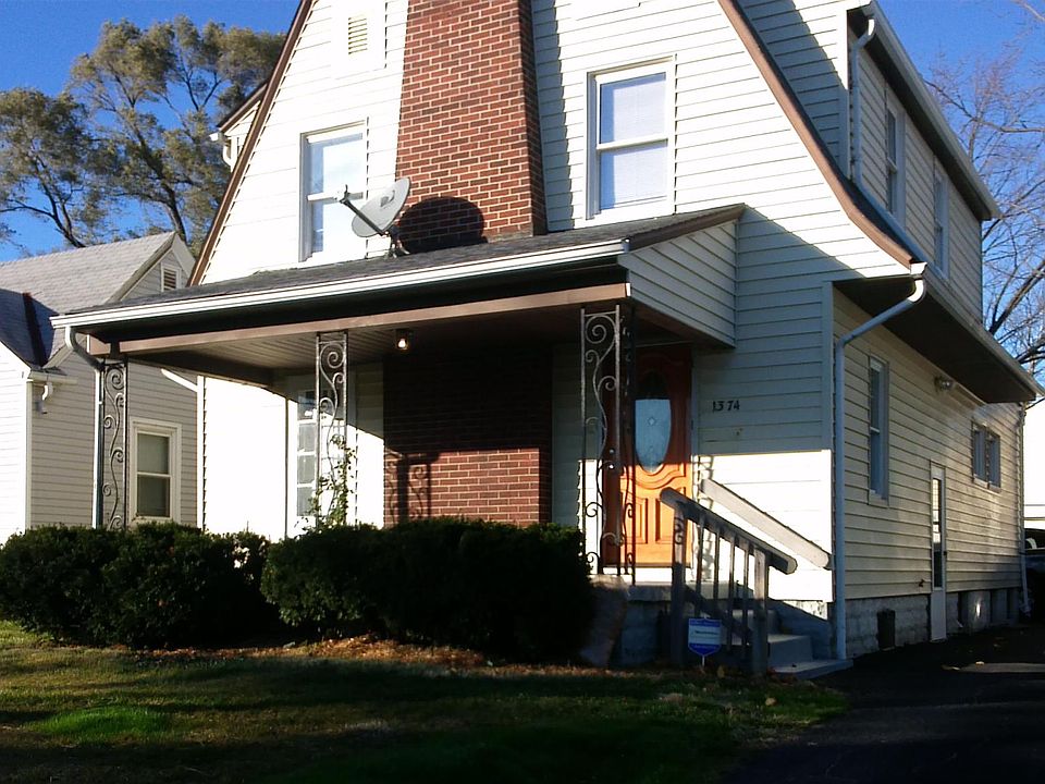 Front exterior of house faces south off of E Hudson St.