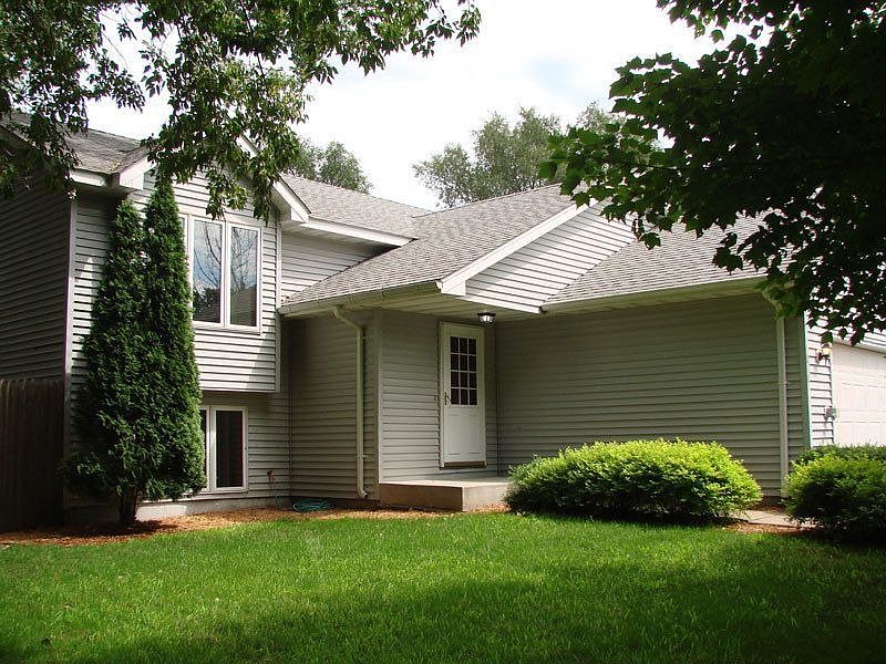 Attractive split level with 3 car garage.