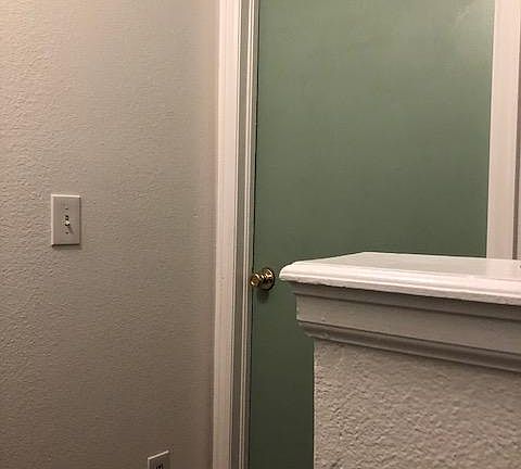 Back bedroom door view from the landing