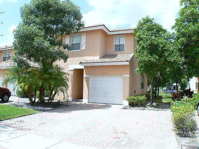 Corner Unit w Large Pavered Driveway