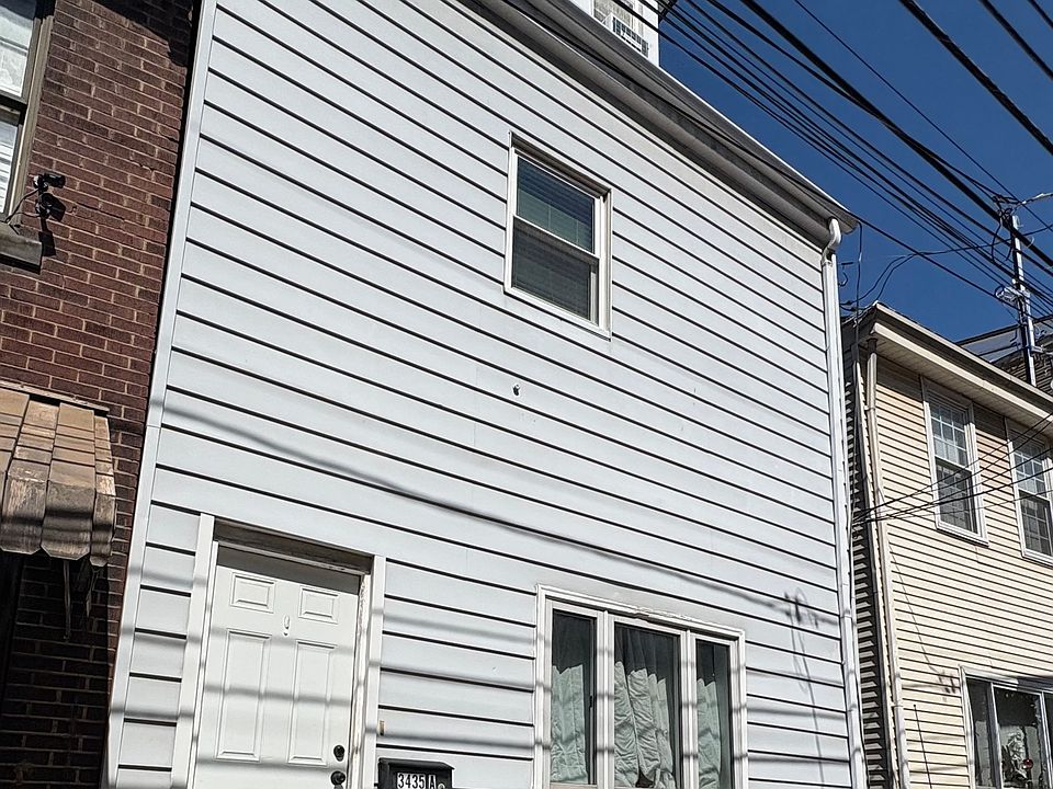 Front of home. Unit 2 is the 2nd and 3rd floor