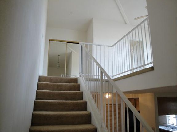 Stairway to Loft with Vaulted Ceiling.