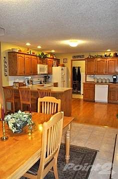 View of kitchen and dining area.