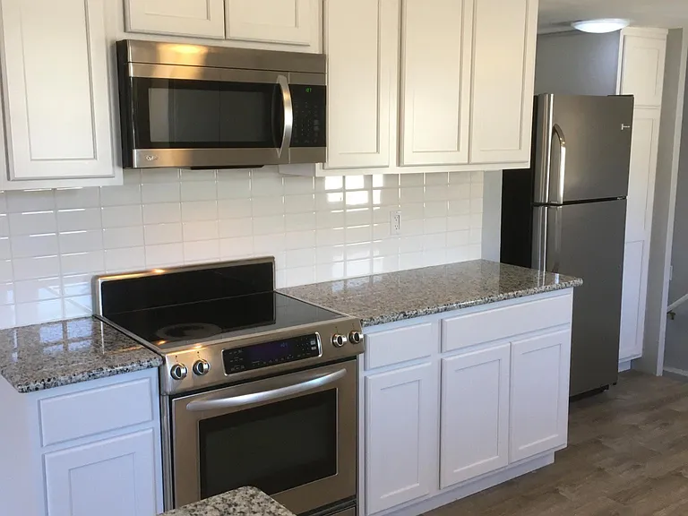 High grade kitchen remodel, custom cabinets and granite counter tops.