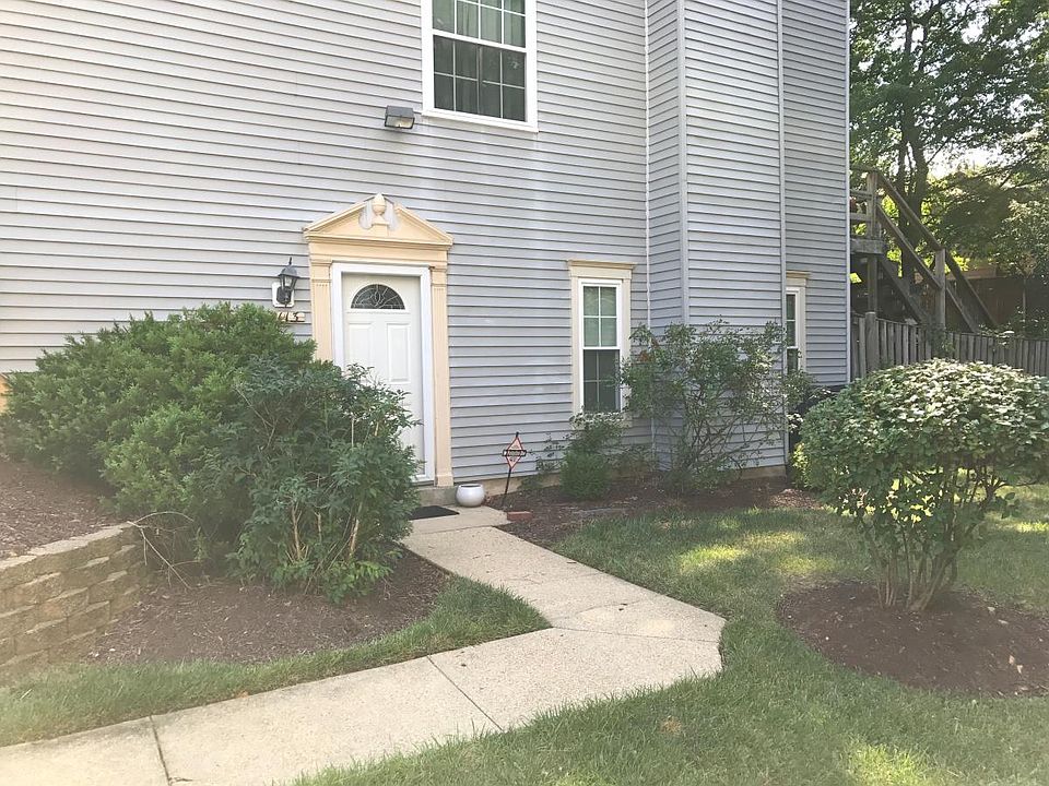 Private Entrance with Custom Landscaping and Rose Bush