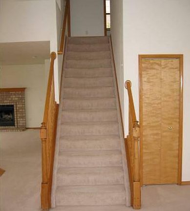 Stairs to 3 bedrooms & 2 baths