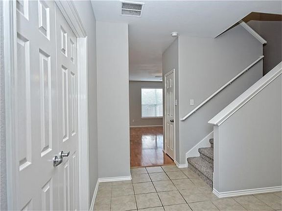 Entrance foyer with study double doors to the left