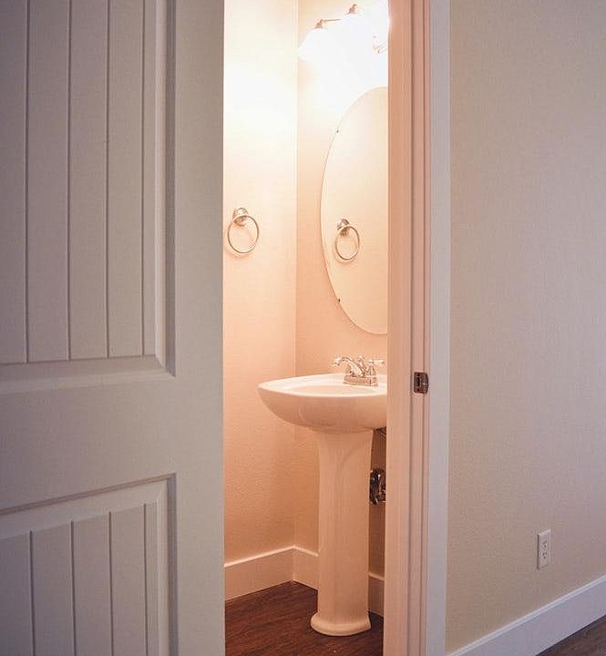 Convenient half bath downstairs off kitchen