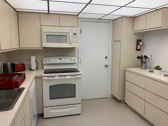 5th image of 9500 W Bay Harbor Dr APT 7E