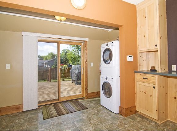 In kitchen laundry with high end washer/dryer.