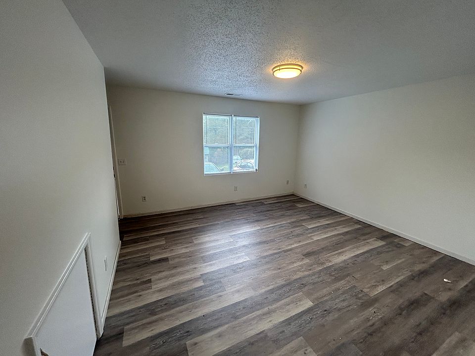 Bright living room with vinyl plank flooring