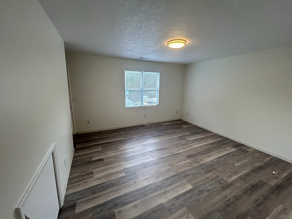 Bright living room with vinyl plank flooring
