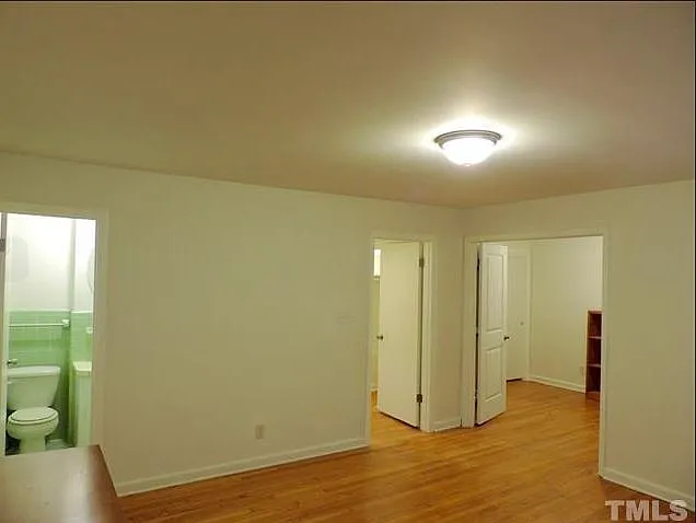 large primary bedroom with bath