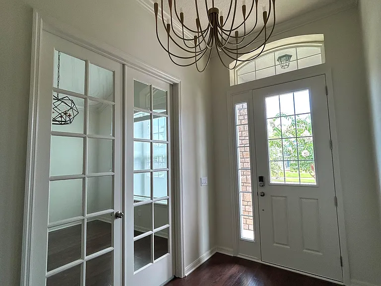 Entry foyer and office room with French doors