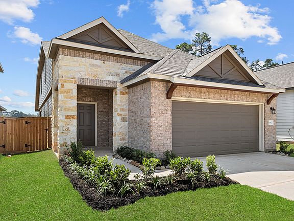 An additional view of the home and entryway