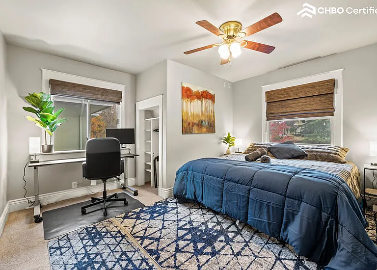 Upstairs large bedroom king bed + workspace