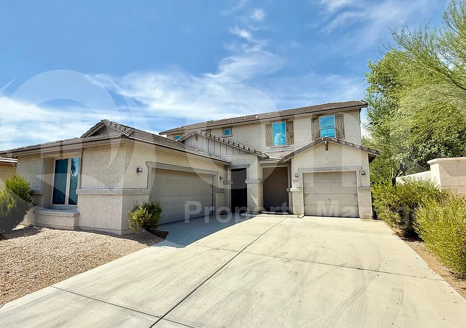 10204 W Lawrence Ln