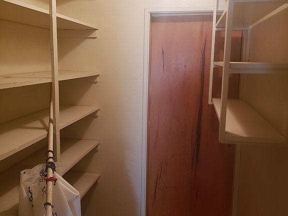 Panrty/storage, approx 12ft deep.