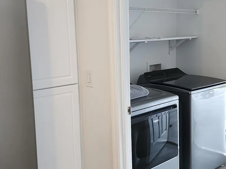 Kitchen to the garage way and laundry