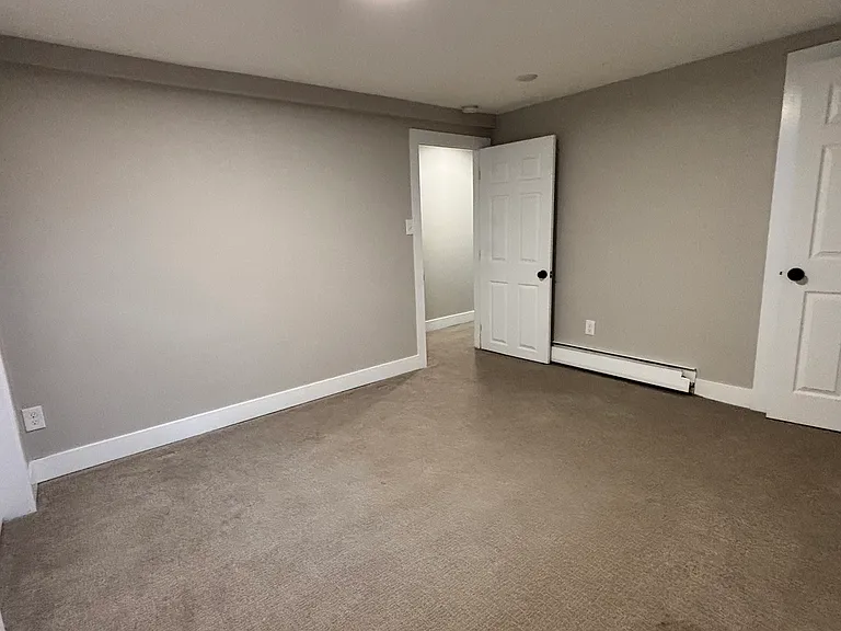 Second bedroom or office space. Spacious area with wall-to-wall closet.